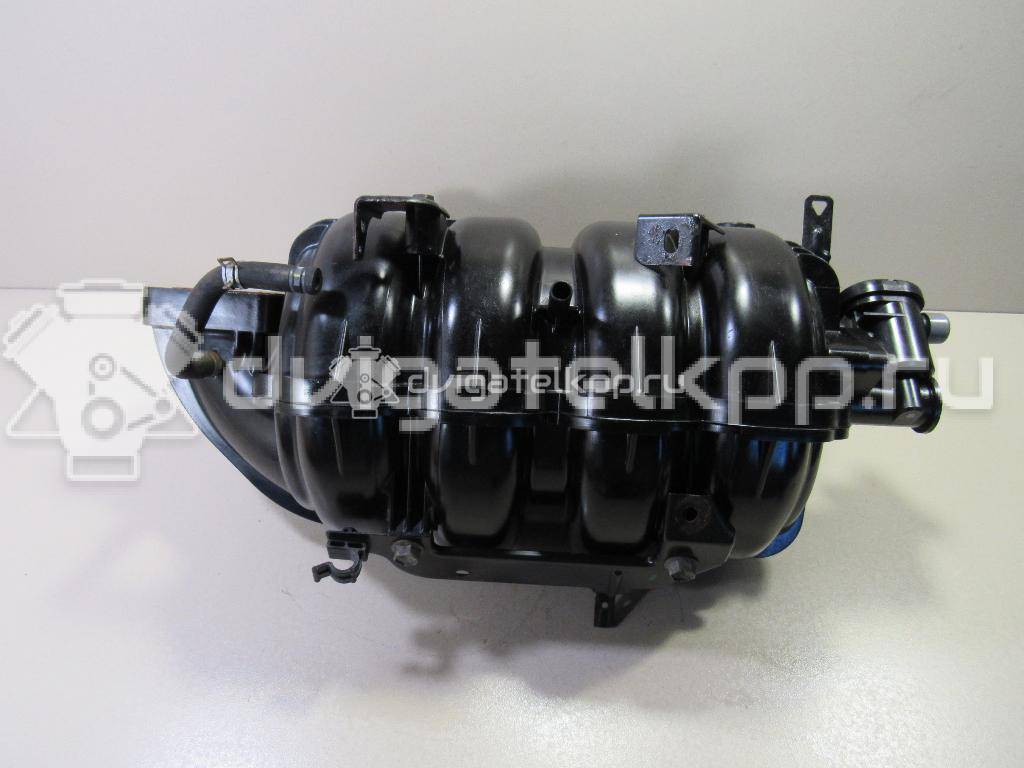 Фото Коллектор впускной для двигателя J20A для Maruti Suzuki / Suzuki / Chevrolet / Geo / Maruti 128-147 л.с 16V 2.0 л бензин 1311080J00 {forloop.counter}}