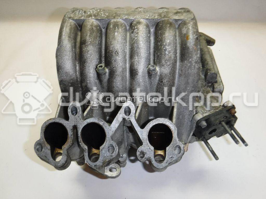 Фото Коллектор впускной для двигателя AAH для Audi A4 / 100 / 80 / A8 / Coupe 174 л.с 12V 2.8 л Супер-бензин (95) неэтилированный 078133205D {forloop.counter}}