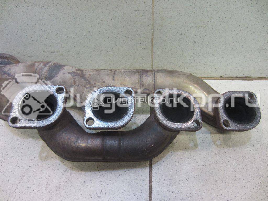 Фото Коллектор выпускной для двигателя M62 B44 (448S1) для Bmw 8 E31 286 л.с 32V 4.4 л бензин 11627500483 {forloop.counter}}