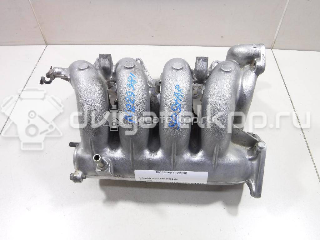 Фото Коллектор впускной для двигателя 4G13 (12V) для Mitsubishi Colt / Mirage / Lancer 60-79 л.с 12V 1.3 л бензин MD350027 {forloop.counter}}