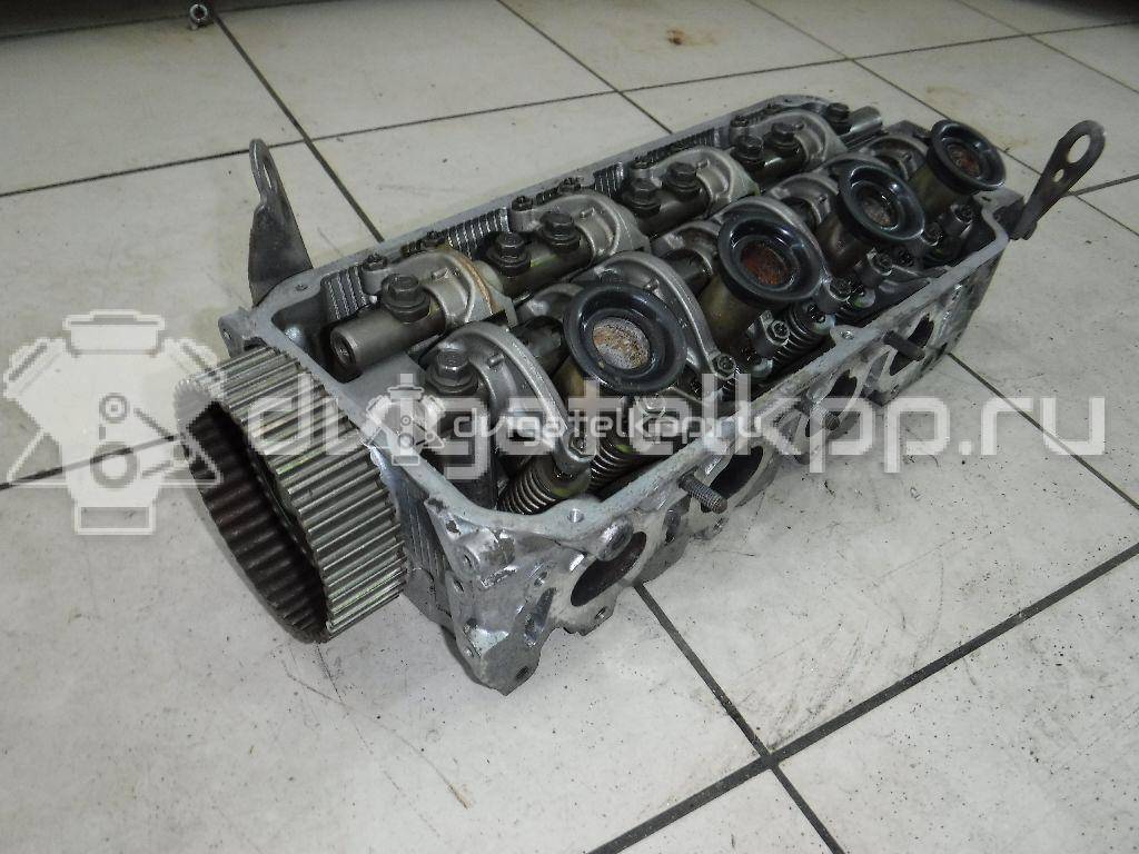 Фото Головка блока для двигателя 4G92 (DOHC 16V) для Mitsubishi Mirage 147-174 л.с 16V 1.6 л бензин {forloop.counter}}