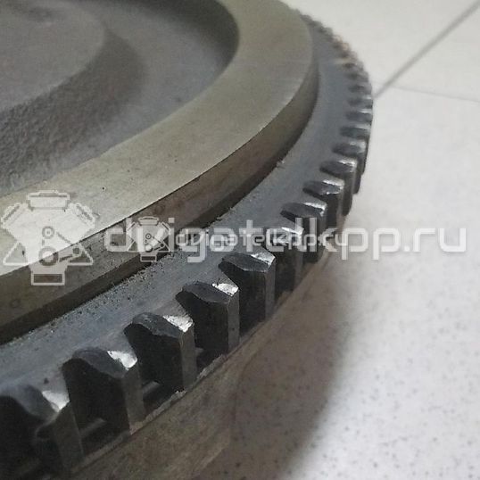 Фото Маховик для двигателя G4GC для Hyundai / Kia 139-146 л.с 16V 2.0 л бензин 2320023810