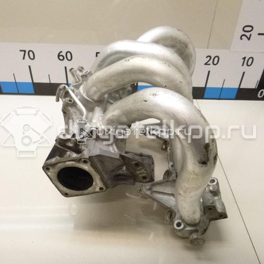 Фото Коллектор впускной для двигателя QG16DE для Nissan Sunny / Bluebird / Avenir / Primera / Almera 102-120 л.с 16V 1.6 л бензин