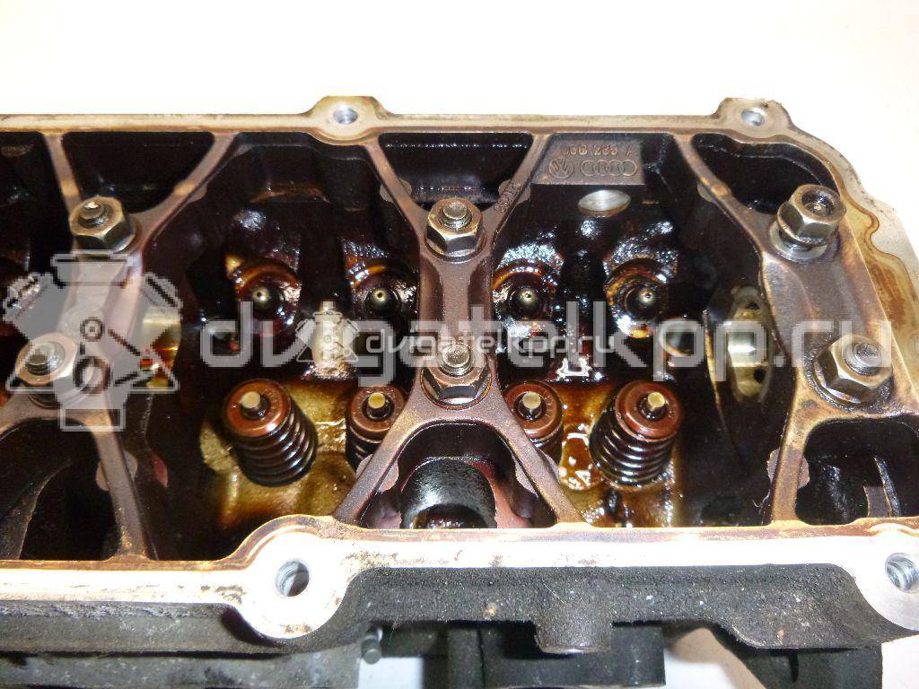 Фото Головка блока для двигателя BFQ для Volkswagen Bora / Golf 102 л.с 8V 1.6 л бензин 06B103351F {forloop.counter}}