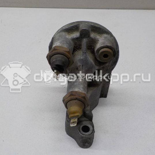 Фото Кронштейн масляного фильтра для двигателя ADZ для Volkswagen Passat / Polo / Derby / Golf 90 л.с 8V 1.8 л бензин 053115417A