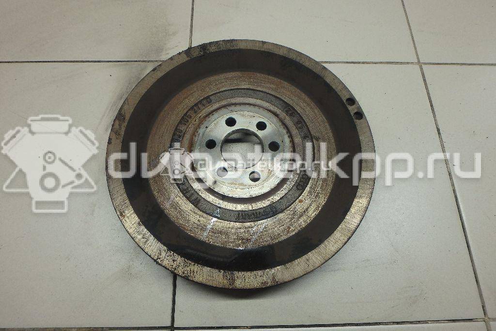 Фото Маховик для двигателя AUB для Volkswagen Polo / Lupo 6X1, 6E1 101 л.с 16V 1.4 л бензин 030105271D {forloop.counter}}