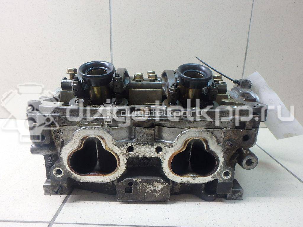 Фото Головка блока для двигателя EJ20 (Turbo) для Subaru Impreza 211-250 л.с 16V 2.0 л бензин 11063AA910 {forloop.counter}}