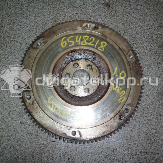 Фото Маховик для двигателя 1KR-FE для Toyota Aygo / Iq J1 / Yaris / Vios 65-71 л.с 12V 1.0 л бензин