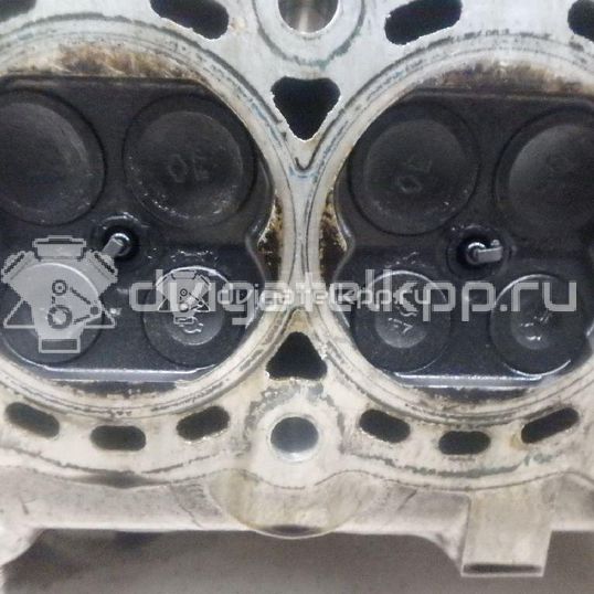 Фото Головка блока для двигателя CR14DE для Nissan Note / Micra 88-98 л.с 16V 1.4 л бензин 11040BX000